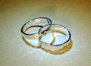 Hammered sterling silver ring set or weddings bands with the ability to customize