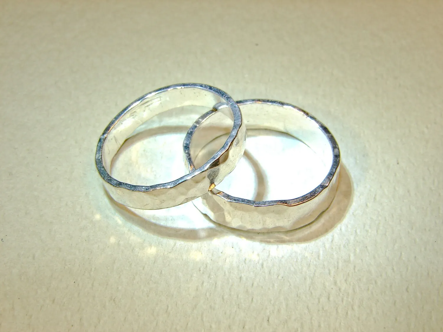 Hammered sterling silver ring set or weddings bands with the ability to customize