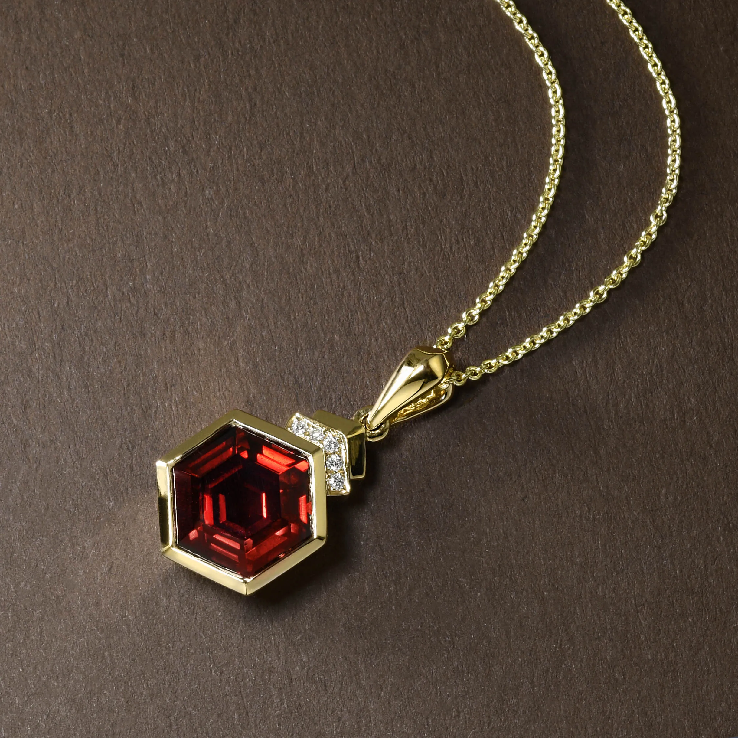 Hexagonal Garnet Pendant In Gold