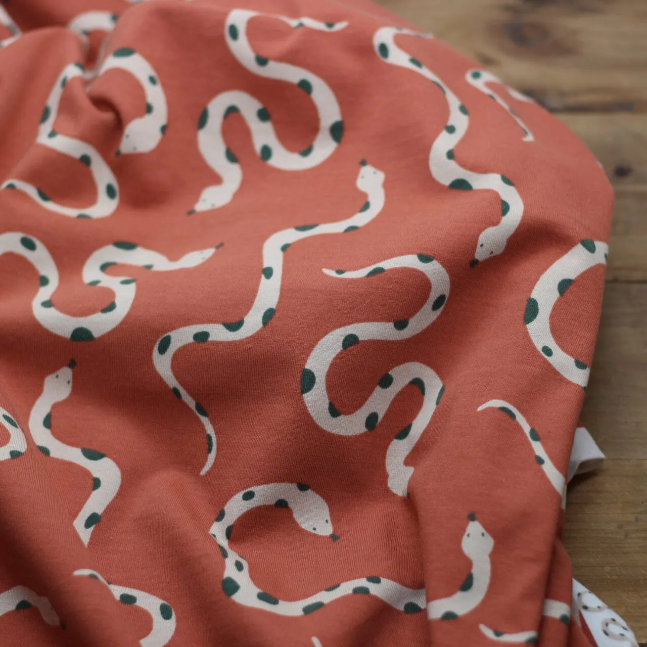 Tissu Jersey de coton - SNAKES - Marron terracotta - Poppy Designed for You (Vendu x10cm)