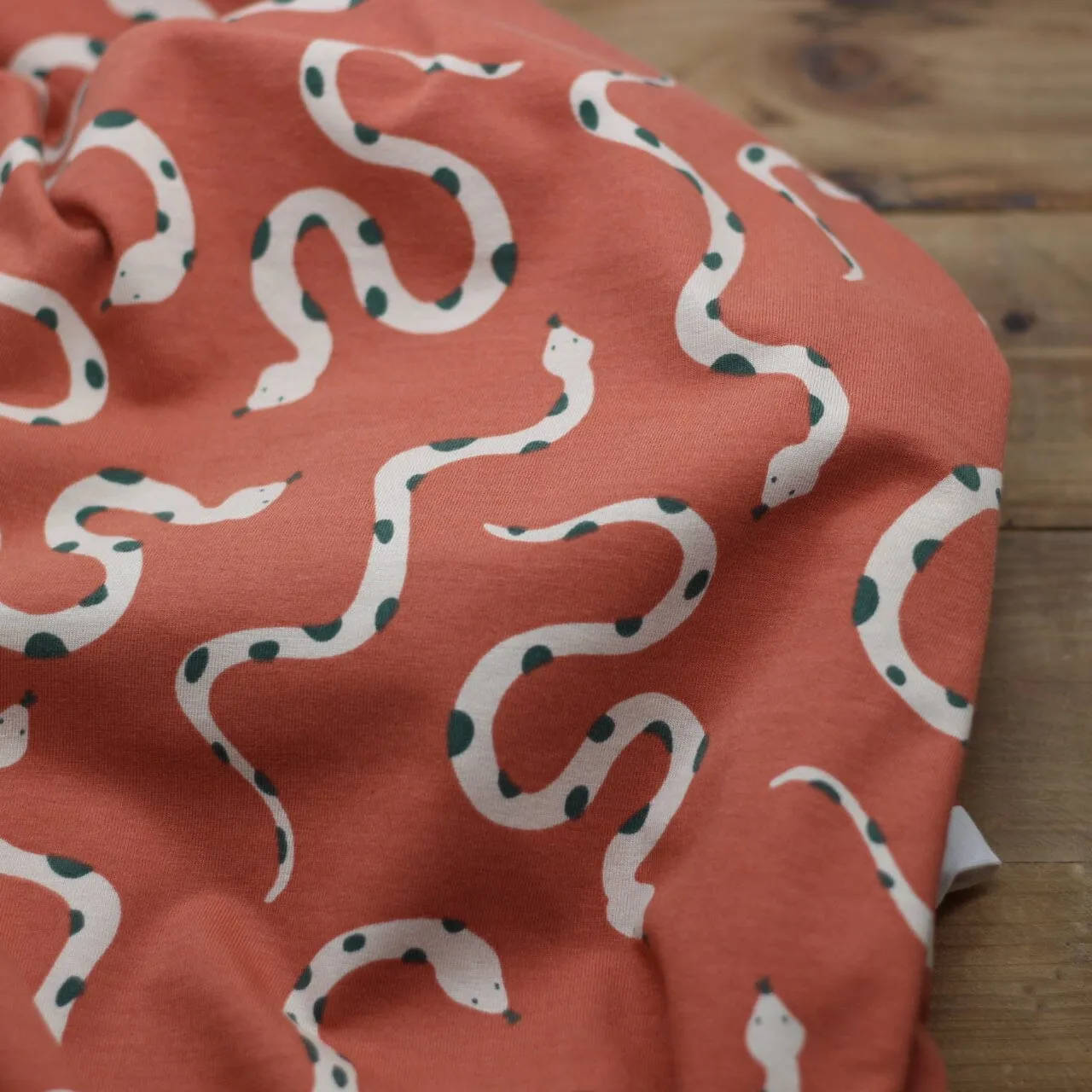 Tissu Jersey de coton - SNAKES - Marron terracotta - Poppy Designed for You (Vendu x10cm)