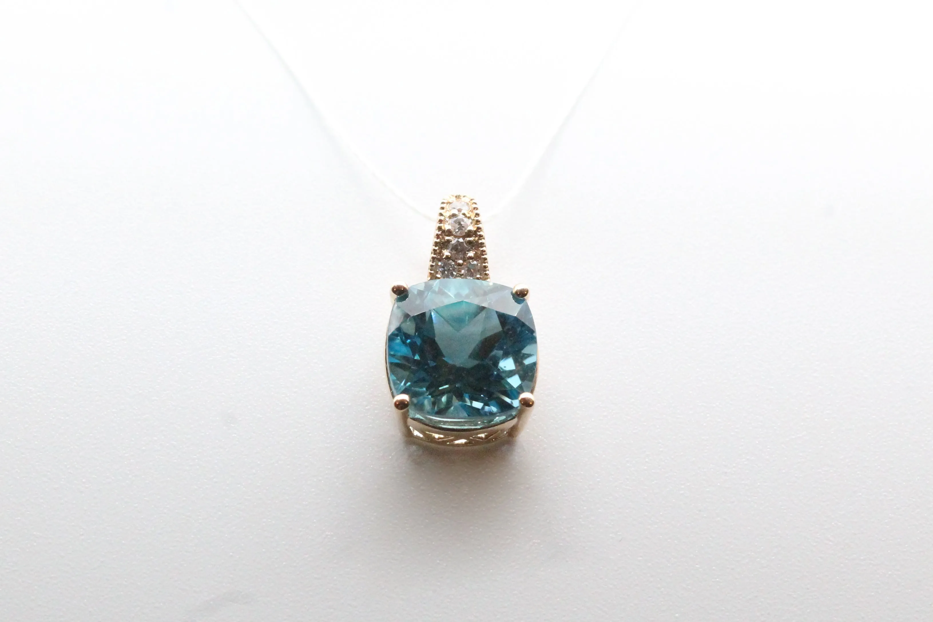 Yellow Gold Cushion Blue Topaz Pendant